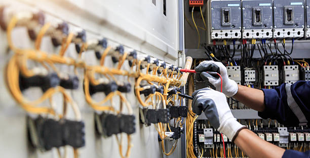 Professional Electrician technician working in Underwood-Petersville, AL